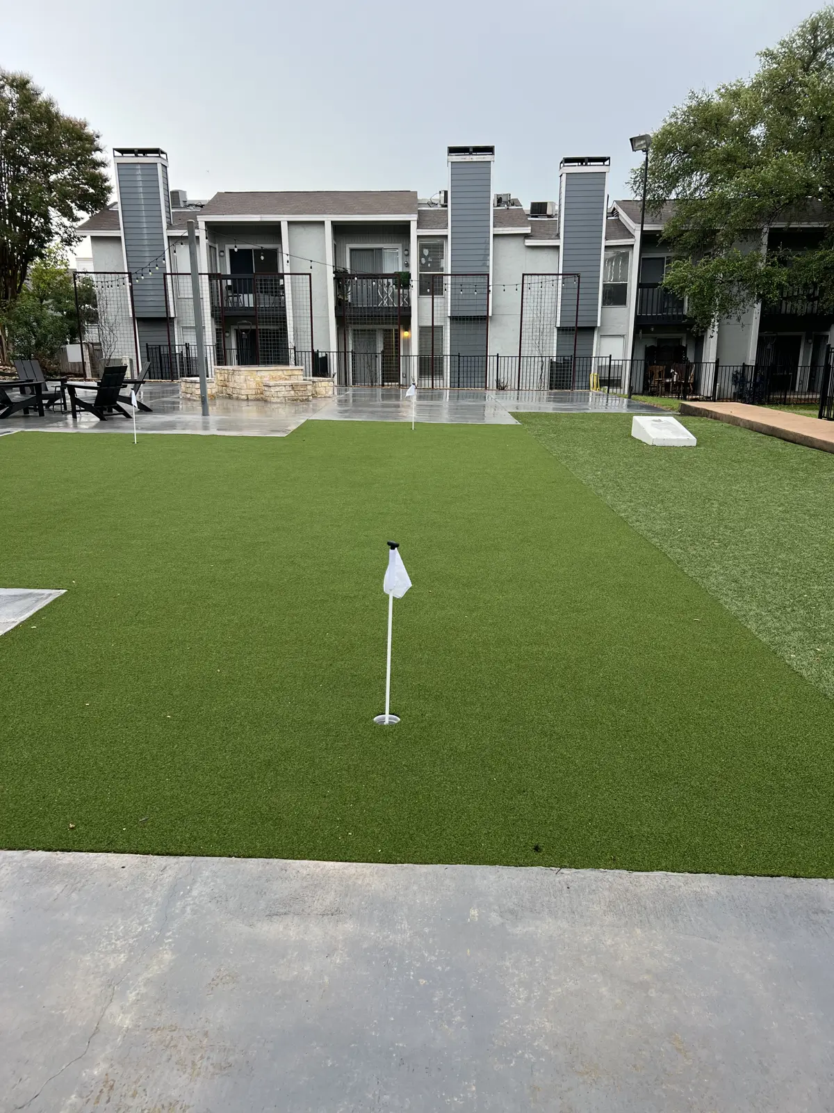 Putting green and outdoor recreation space at Grove at Northwest Hills.