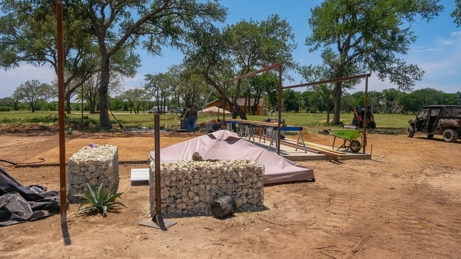 During construction: gathering-area seating and covered structure.